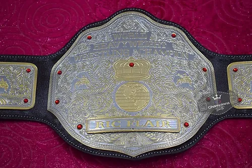 "Embody the legacy of WWE legend Ric Flair with our premium replica World Heavyweight Championship Belt. Meticulously crafted, customizable, and affordable. Order now!"